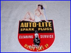 VINTAGE AUTO LITE SPARK PLUGS With WOMAN IN HAT! 13 METAL GASOLINE & OIL SIGN