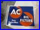 Vintage-1950-AC-Delco-Chevrolet-OIL-FILTERS-Flange-Sign-Heavy-Painted-Metal-NICE-01-sf