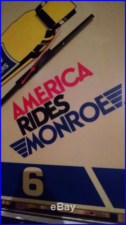 Vintage 1970s 1980s 36 square America Rides Monroe shocks clock