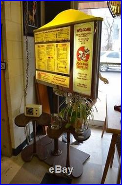 Vintage Dog n Suds car hop menu from drive in restaurant, Lighted on stand