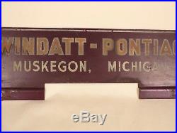 Vintage Pontiac Car Dealer License Plate Topper Emblem Advertising Muskegon MI